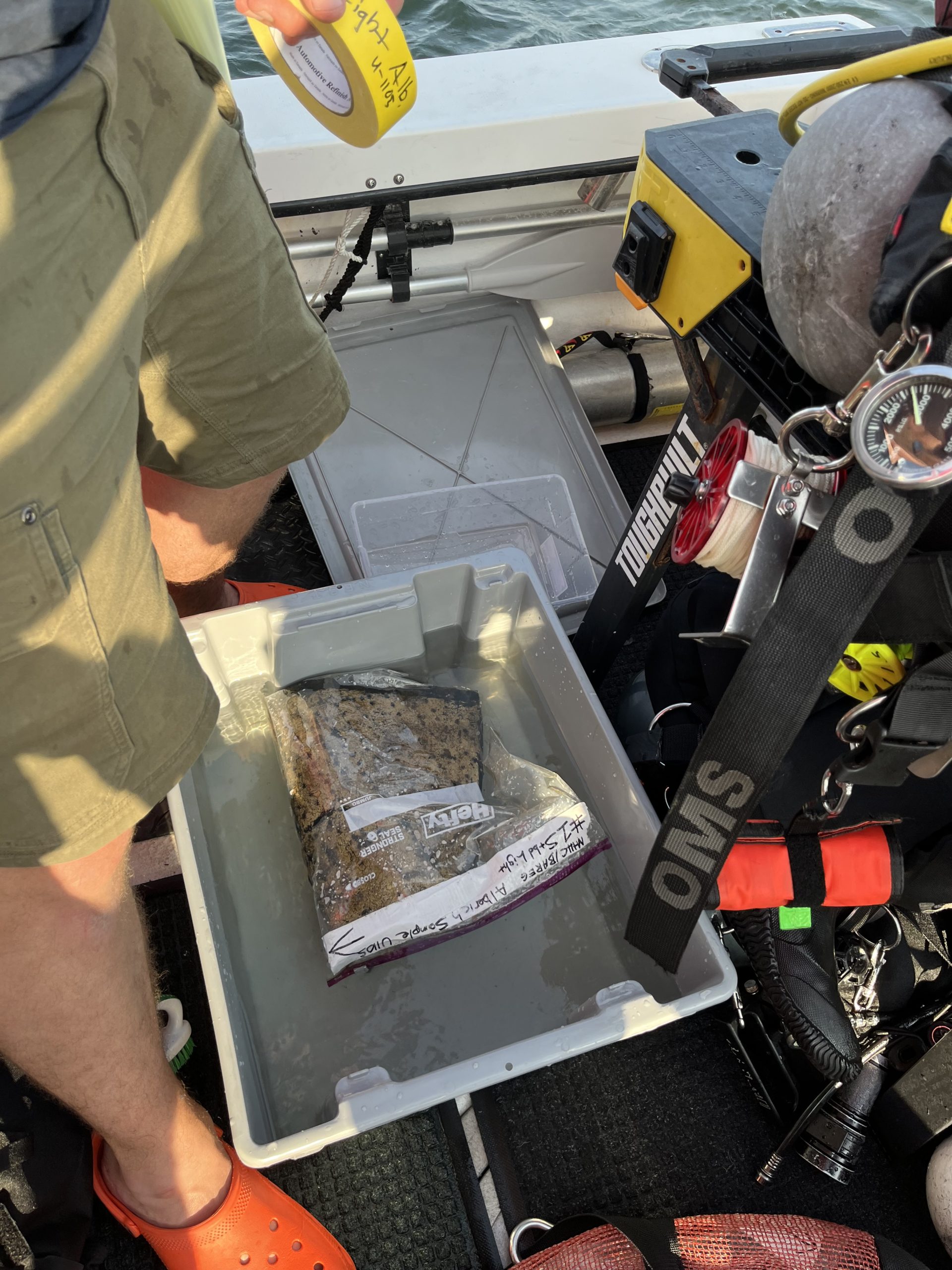 5. Alberich sample transferred to NHHC staff for transport to the command’s conservation lab. Photo Source: Fred Engle/BAREG