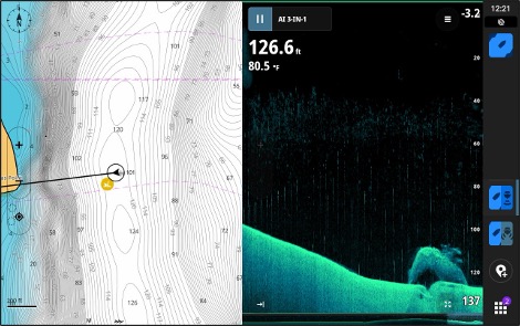 S-49 lies in the Patuxent River channel between Thomas and Patience Points. The slope from Point Patience is seen in the above down scan and chart plotter display.