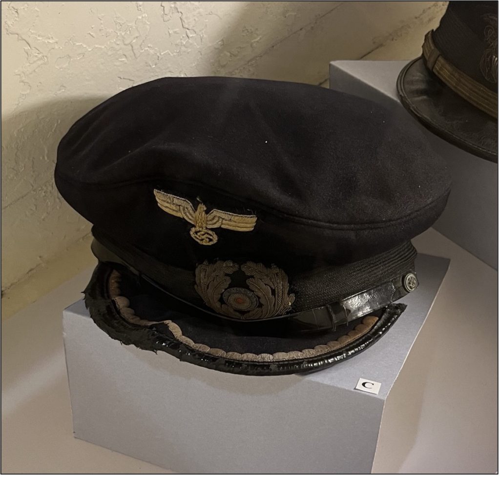 Kriegsmarine officer’s cap recovered after the 5&6 May 1945 attack on and sinking of the U-853 off Block Island, Rhode Island. The cap is on display aboard the museum ship USS Slater (DE-766), the only surviving afloat destroyer escort from WWII, berthed on the Hudson River in Albany, NY.