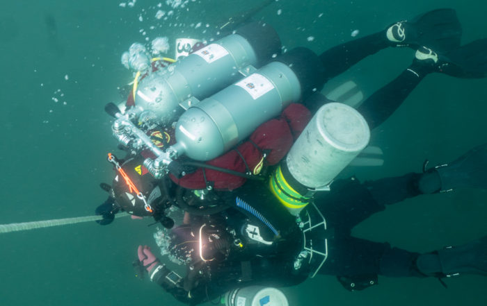 1. BAREG divers basking in the warmth of the 20-foot deco stop on ascent from the U-869. Photo Source: Fred Engle/BAREG