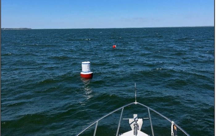 Buoy on station for 2026 dive season. Diver floats and temporary ball visible upriver.