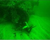 HMT Birkenhead’s side lever steam engine, diver for scale.